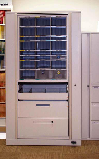 Rotary files with mail slots. Systems like this are available on Texas State Contract (TXMAS). Systems like this are available on GSA Contract